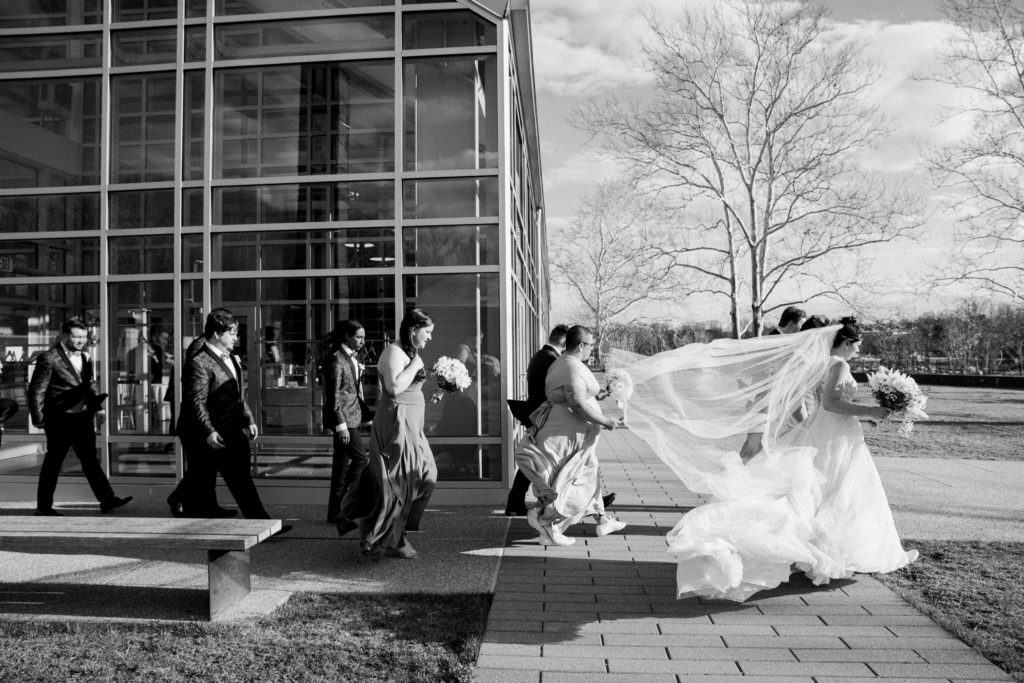 Bridal party walking together at the River View at Occoquan