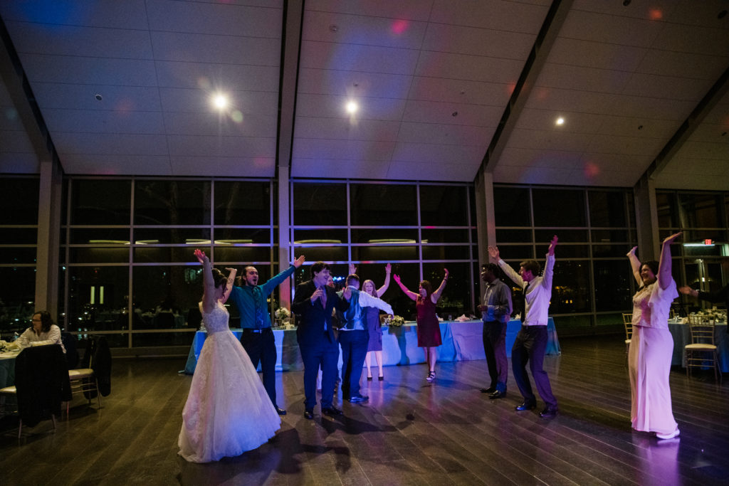 Guests dancing at a wedding reception at the River View at Occoquan