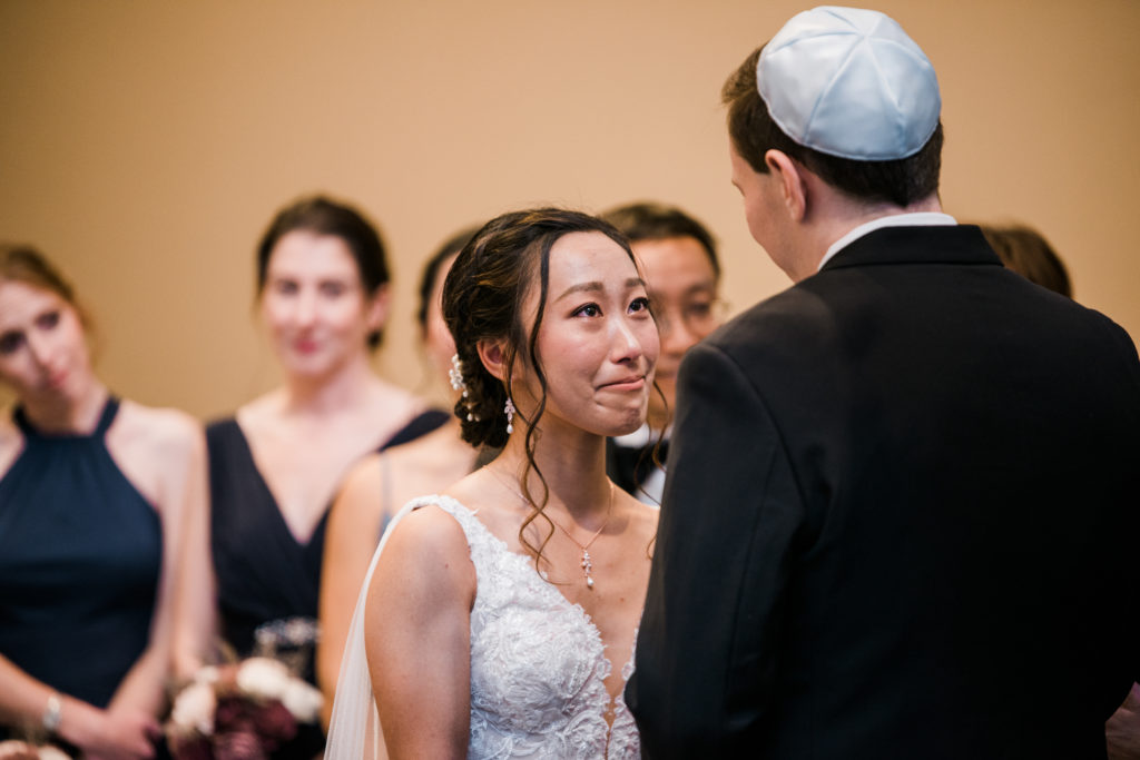 A bride looking a a groom