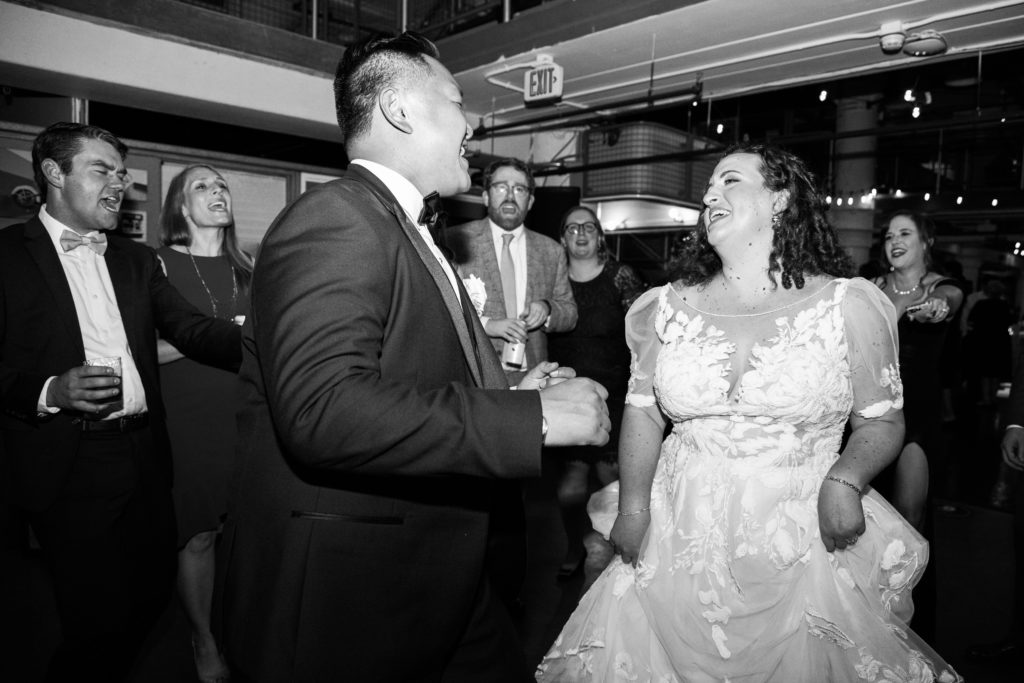 A bride and groom dancing