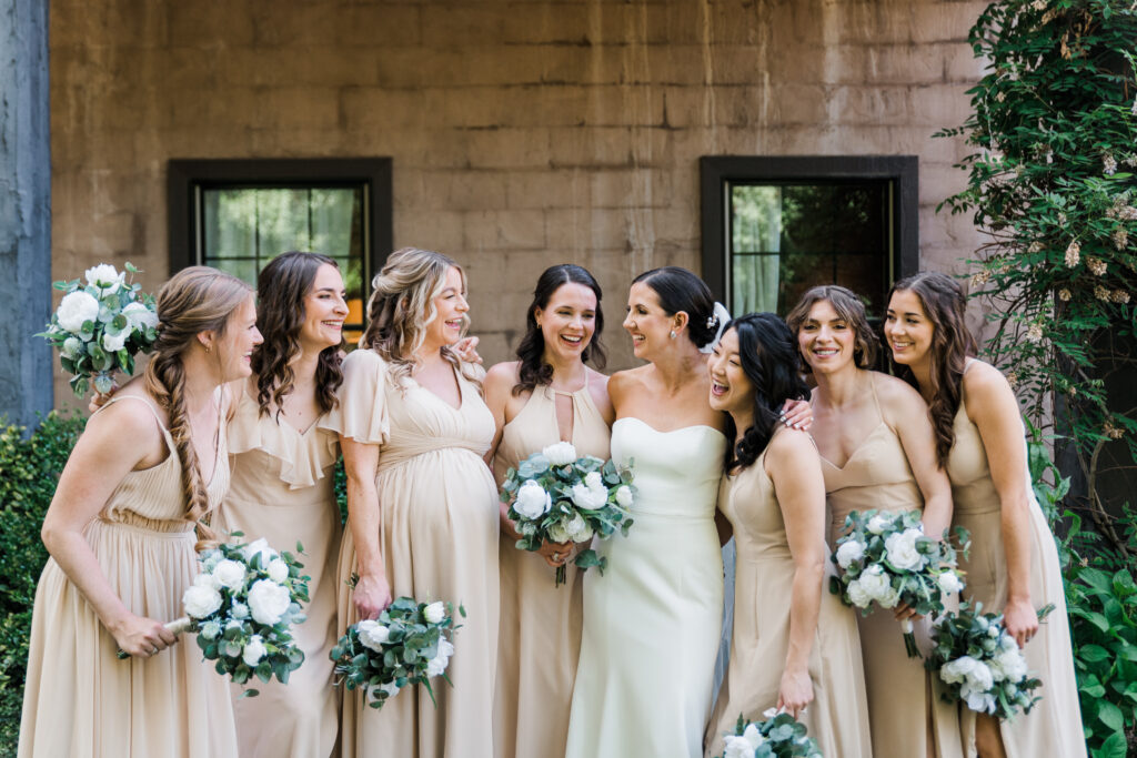 A bride standing with her bridesmaids