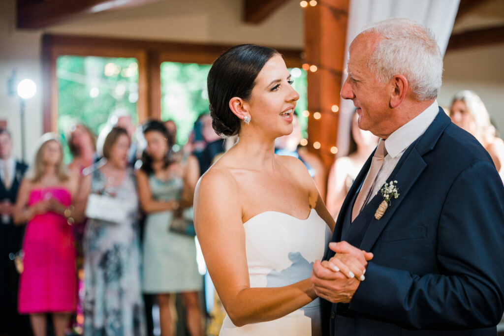 A bride dancing with her father